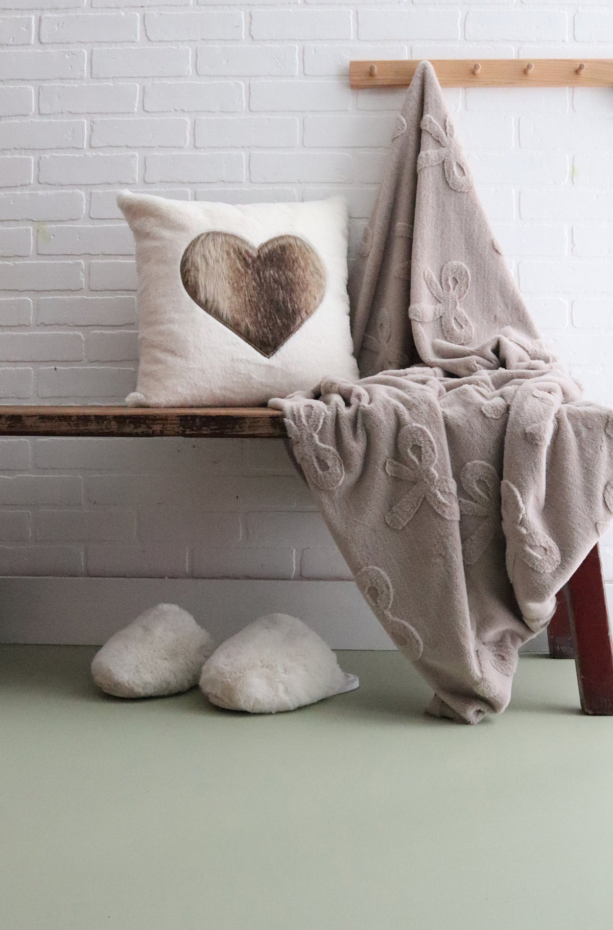 Sculpted Bow Faux Rabbit Fur Reverse Throw Cream