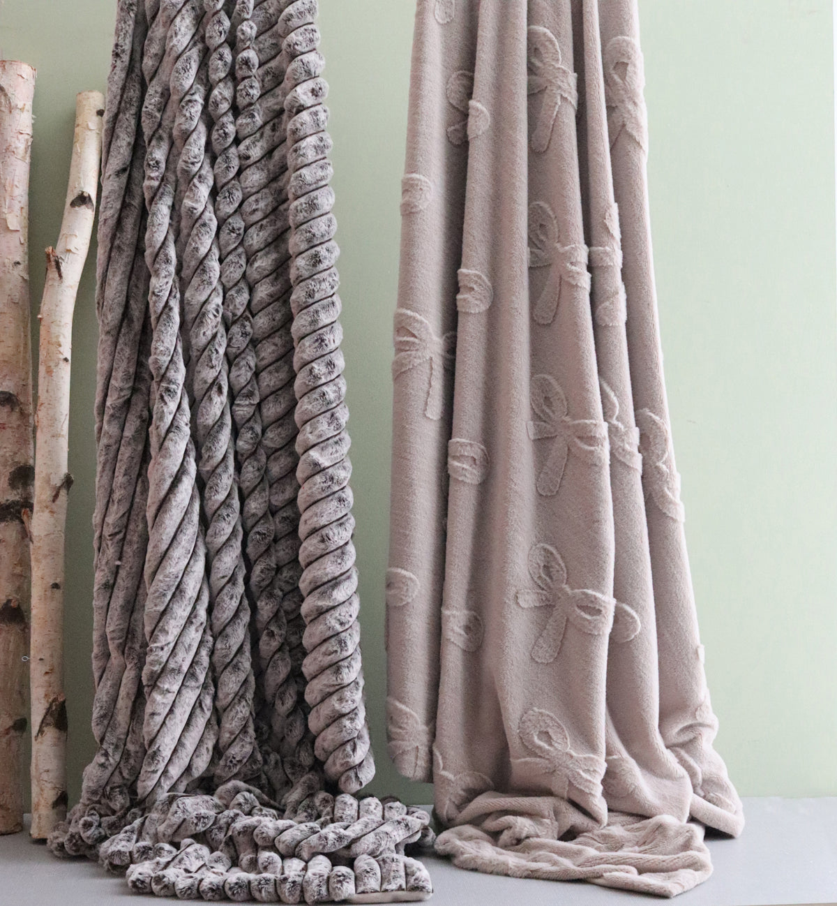 Sculpted Bow Faux Rabbit Fur Reverse Throw Cream